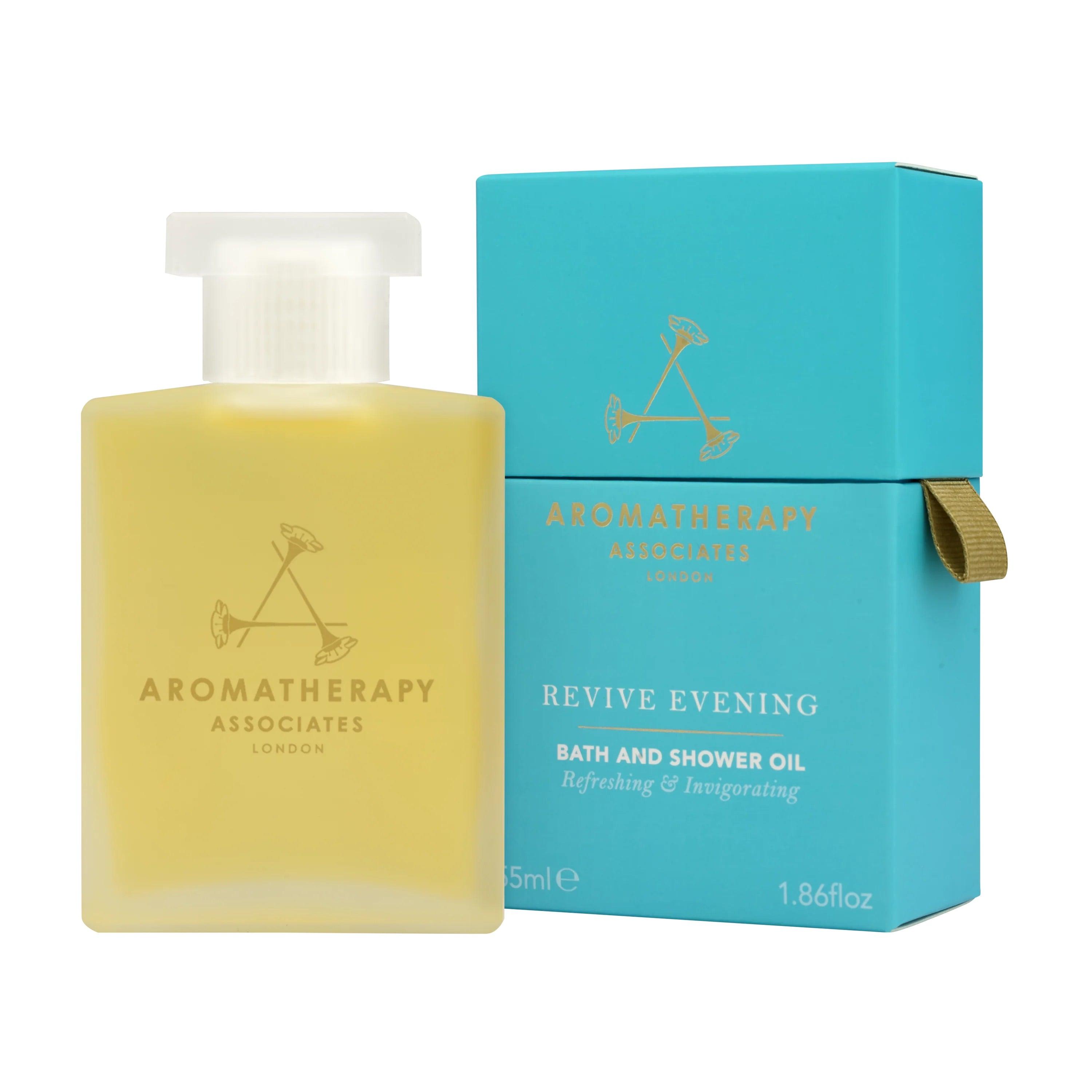 Aromatherapy Associates Revive Evening bath & shower oil, 55 ml flaske ved siden af en æske.