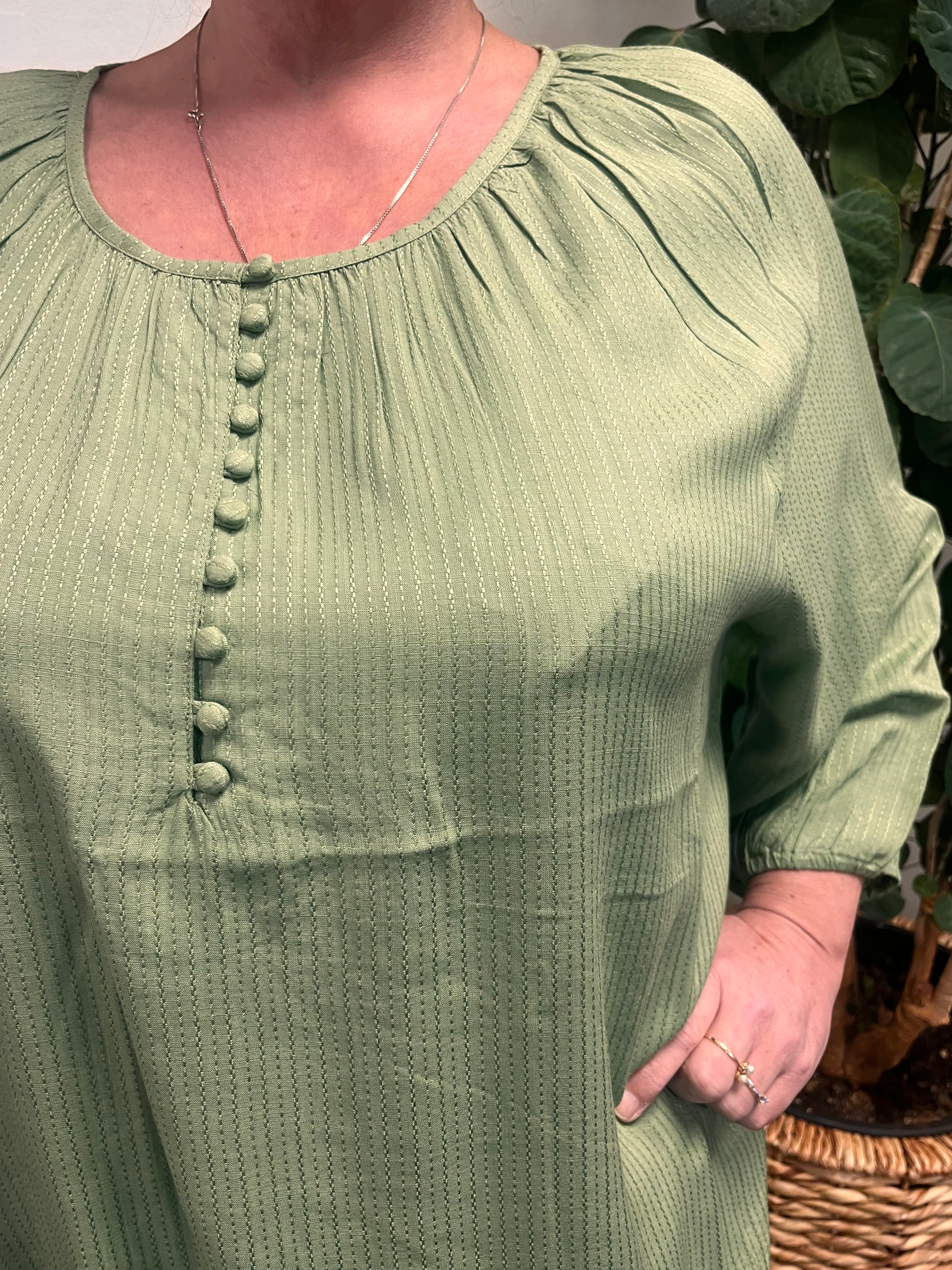 No. 1 By Ox tunika, tæt på detaljerne.