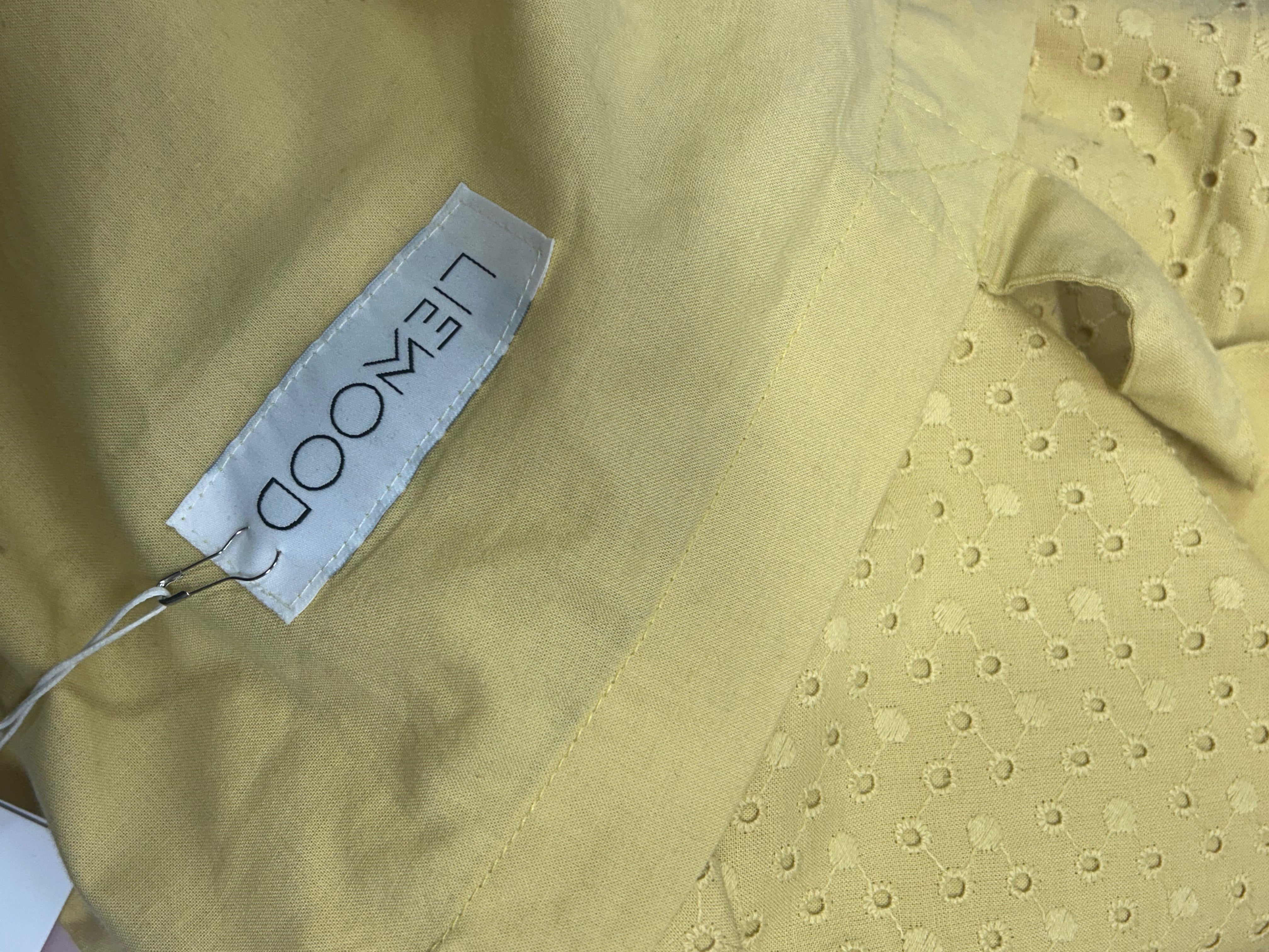 Liewood junior sengesæt - Avery Anglaise på gul stofbaggrund.